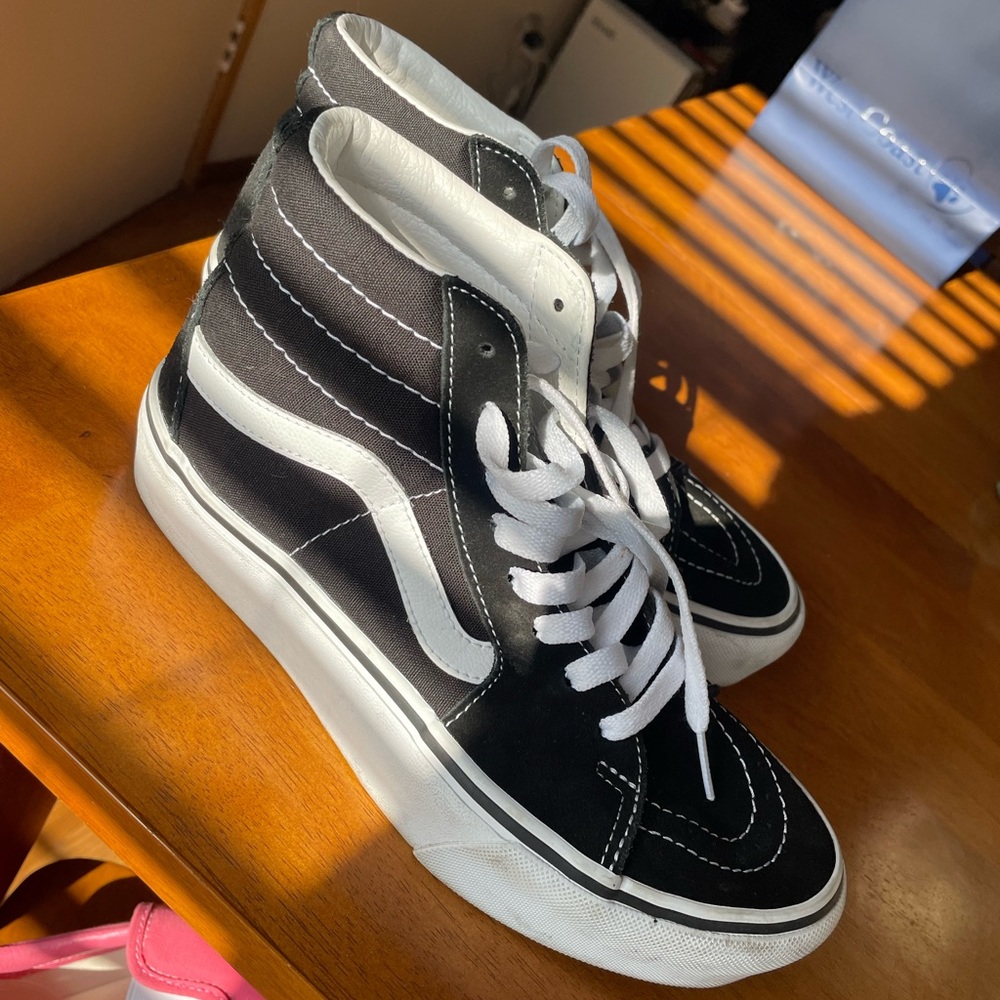 Black and white platform Vans